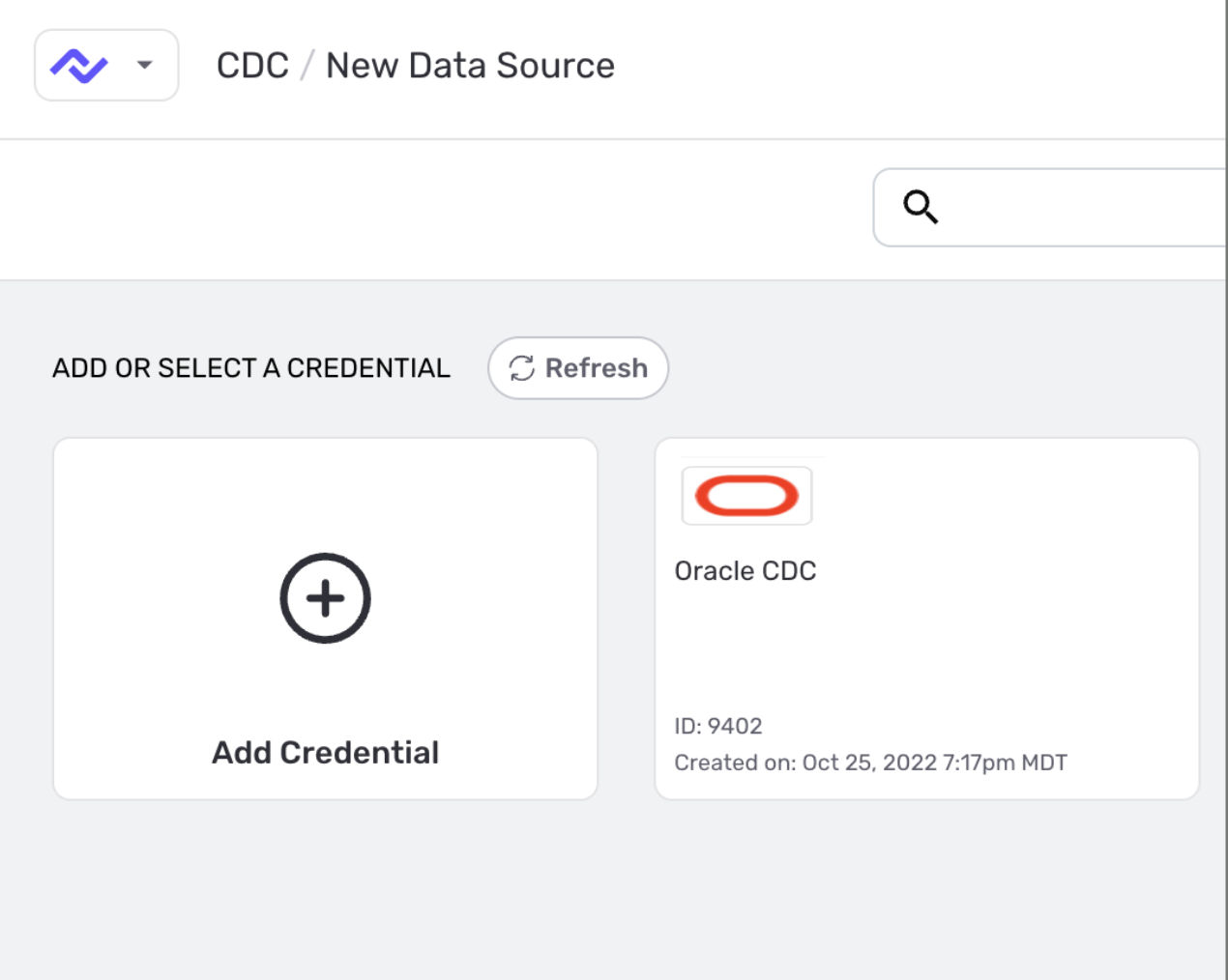 Select an existing Oracle credential or add a new one