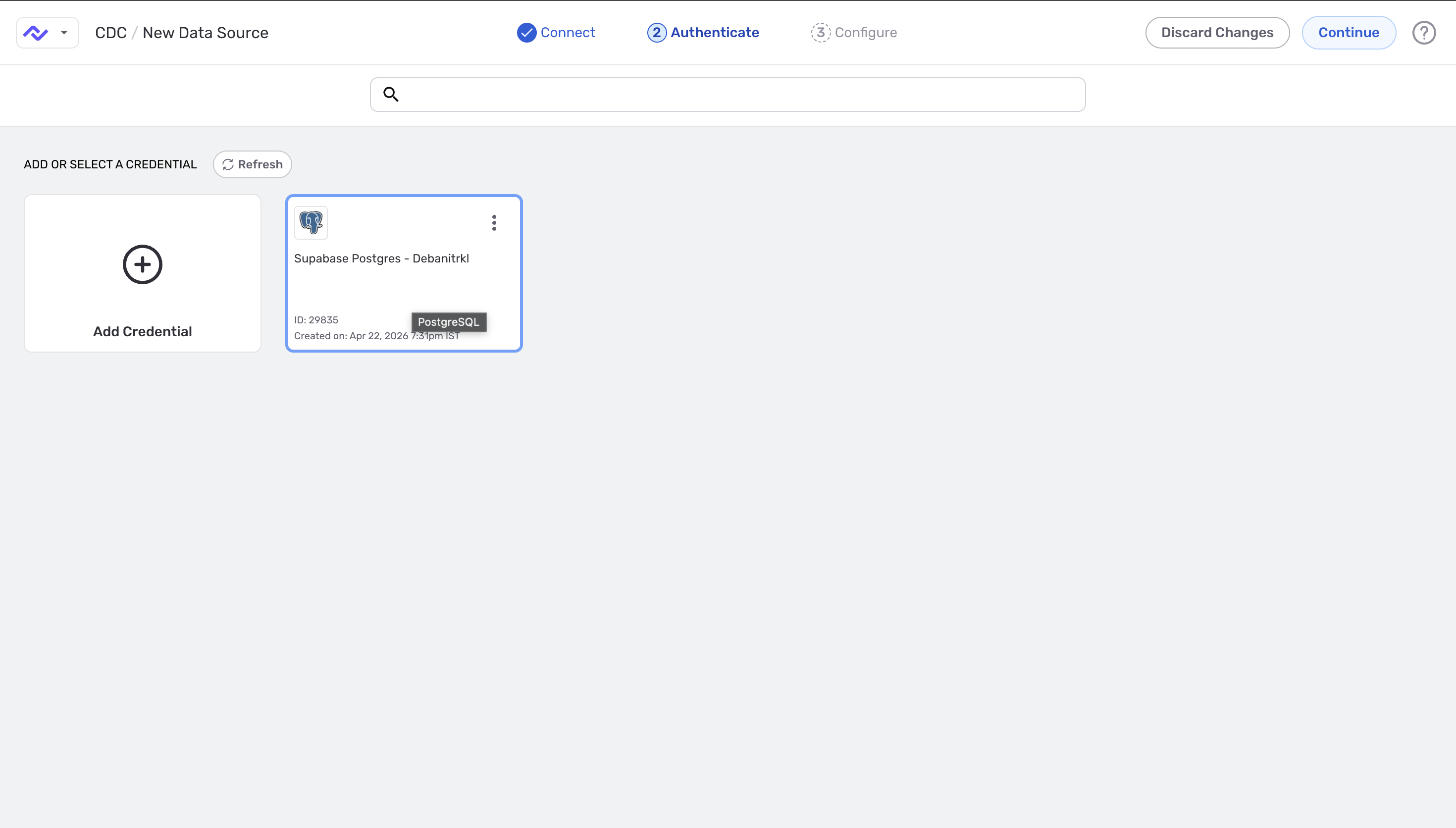 Select an existing PostgreSQL credential or add a new one
